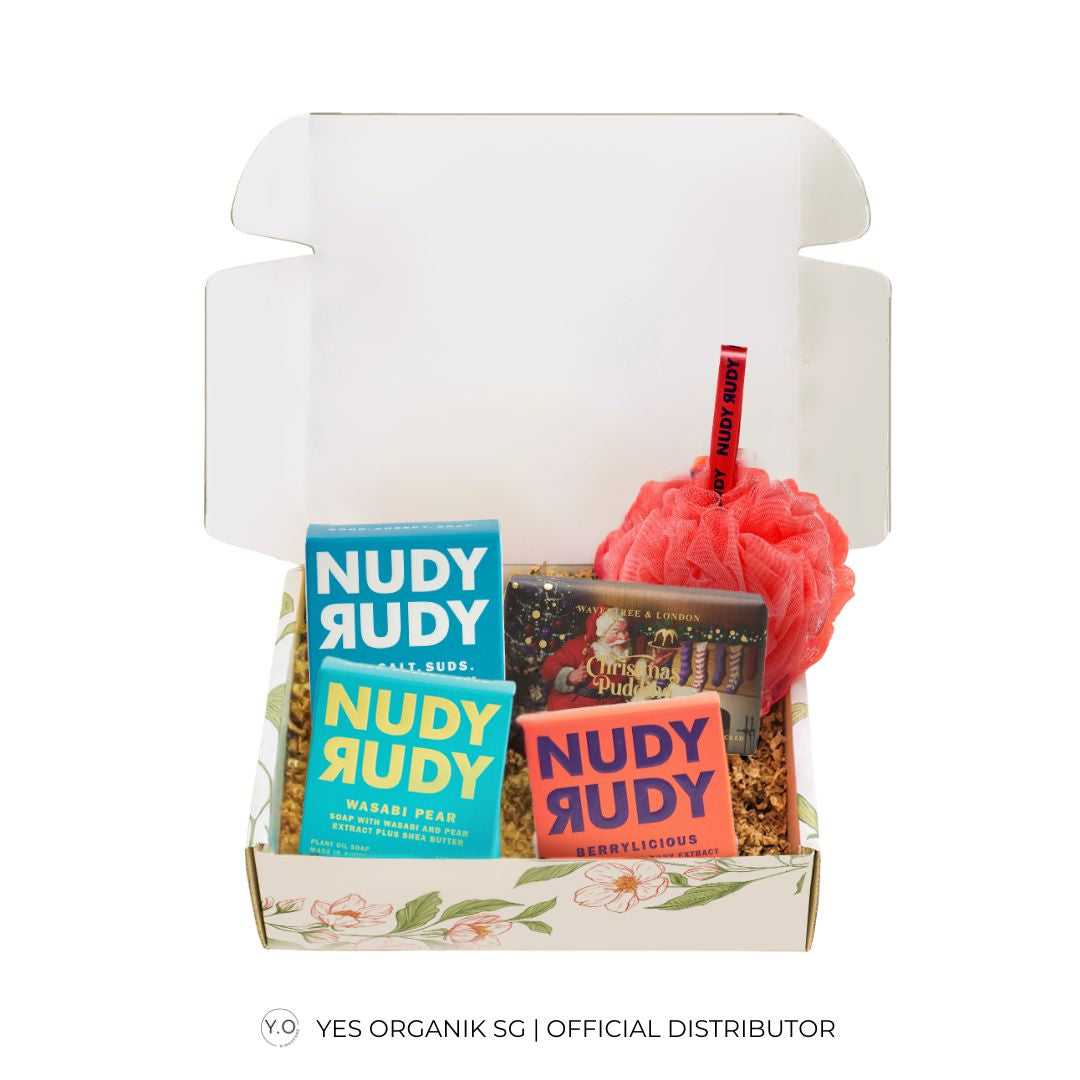 Nudy Rudy bath products including Wavertree soap bar and a shower puff in a christmas gift box.