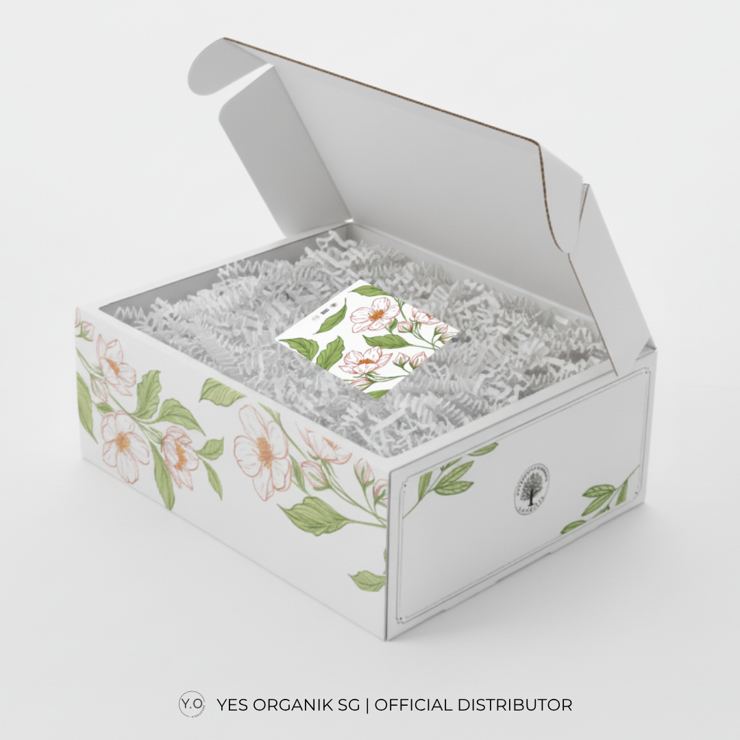 Christmas self-care gift box with white crinkle paper and greeting card 